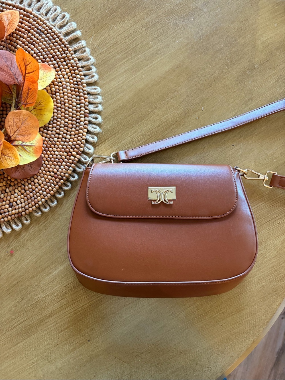 Brown Saddle Crossbody Bag with Gold Hardware